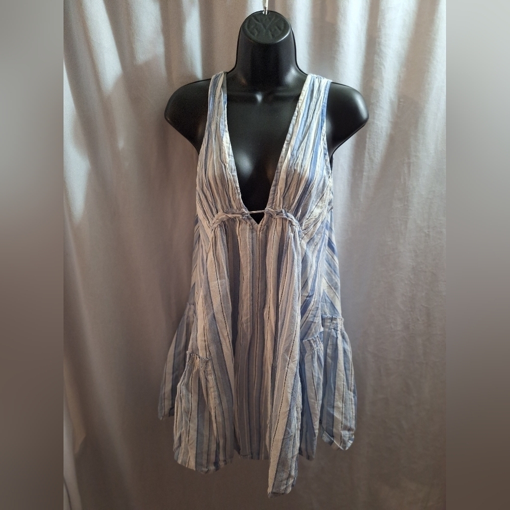 Striped dress would look cute over a bathing suit